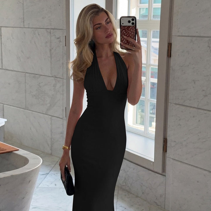MARINA maxi dress with a ruched bust, neck closure, and open back