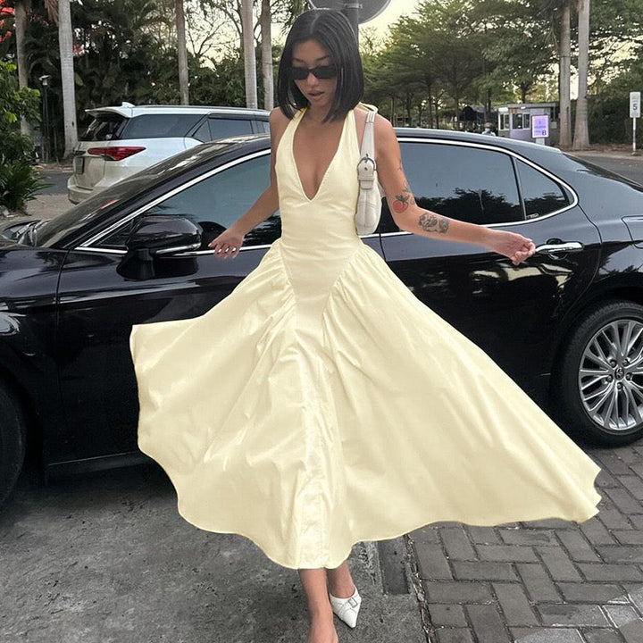 AMALIYA A-line maxi dress with a neck tie and open back