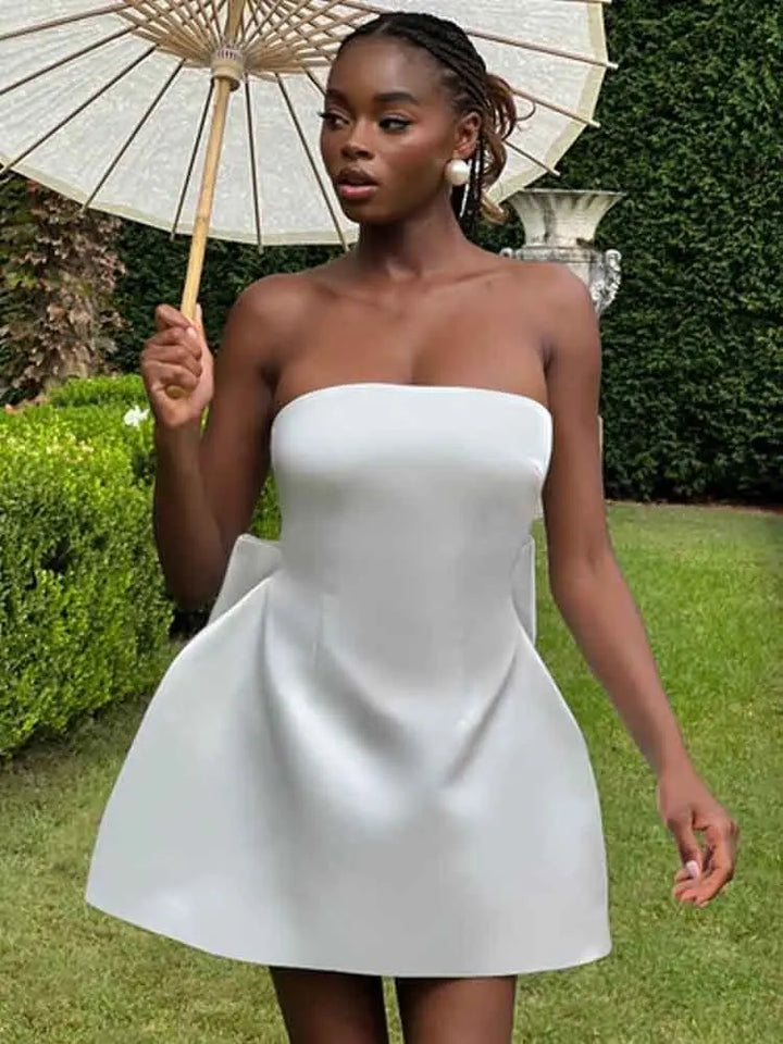 Satin mini dress in A-line cut with tie bow back detail for waist fit - Lilia