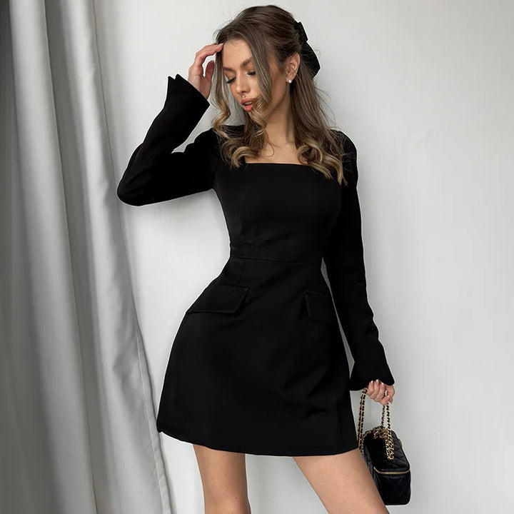 Tailored A-line mini dress with back tie waist and pocket detail - Yar