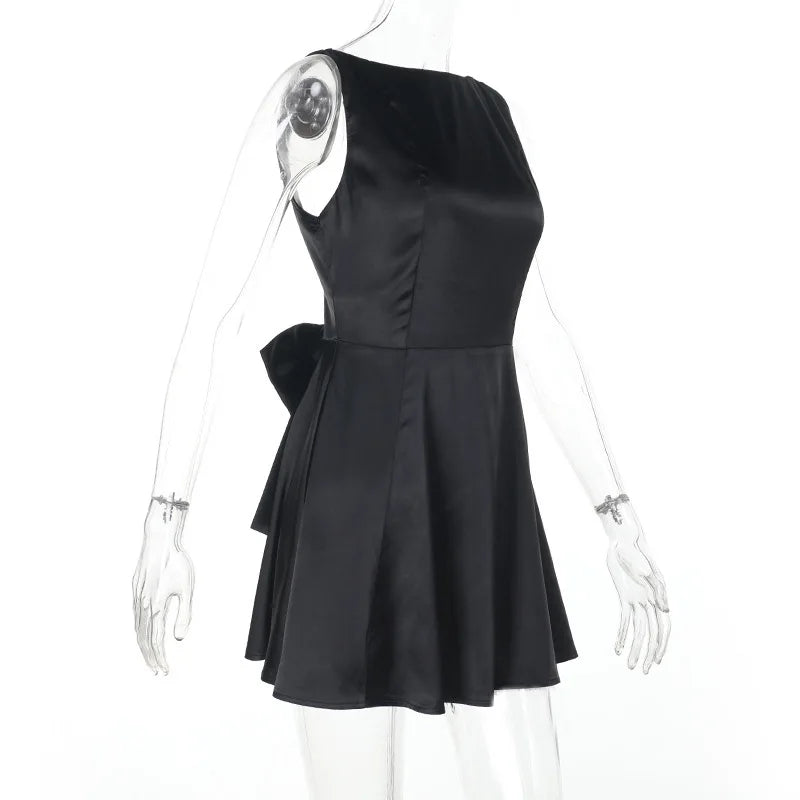Silk satin mini dress in A-line cut with open back and bow detail - ELLIE