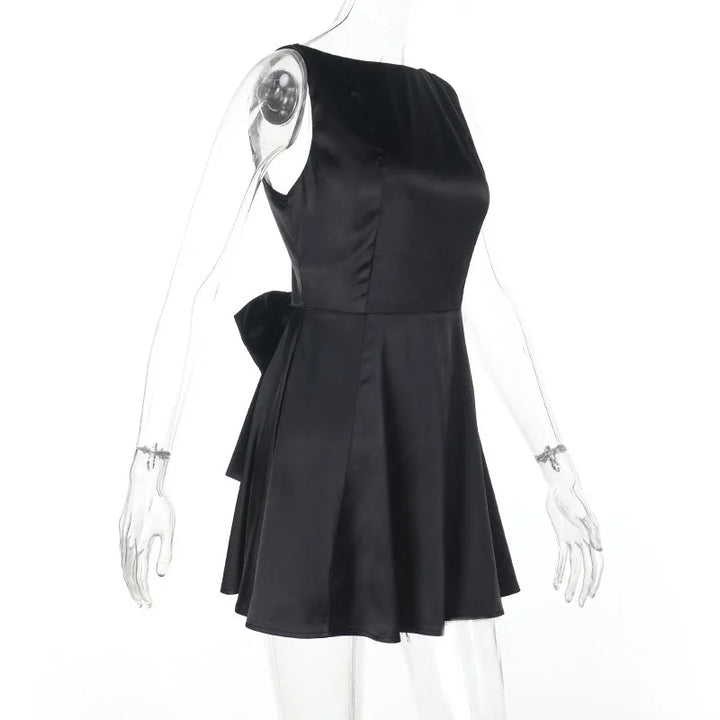 Silk satin mini dress in A-line cut with open back and bow detail - ELLIE