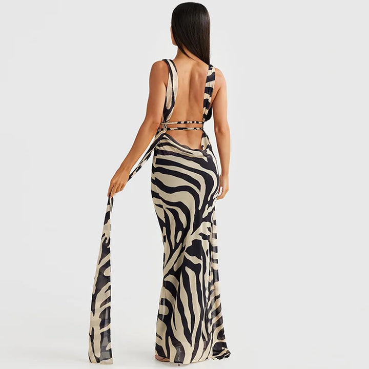 Maxi evening dress with open back and deep neckline - Adelina