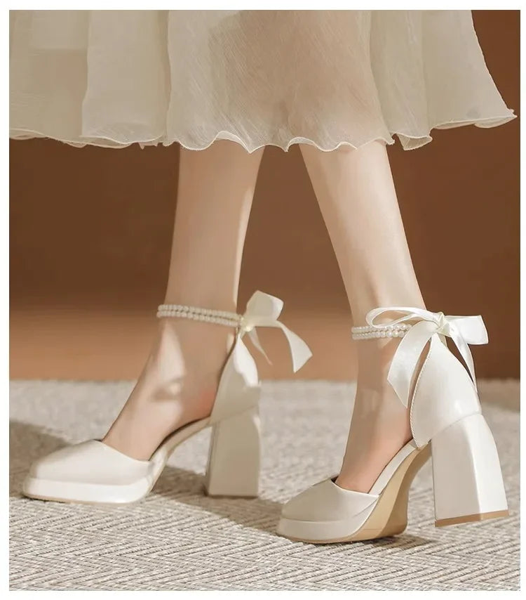Shiny Faux Leather High Heels with Pearl and Bow Decoration - Vivian