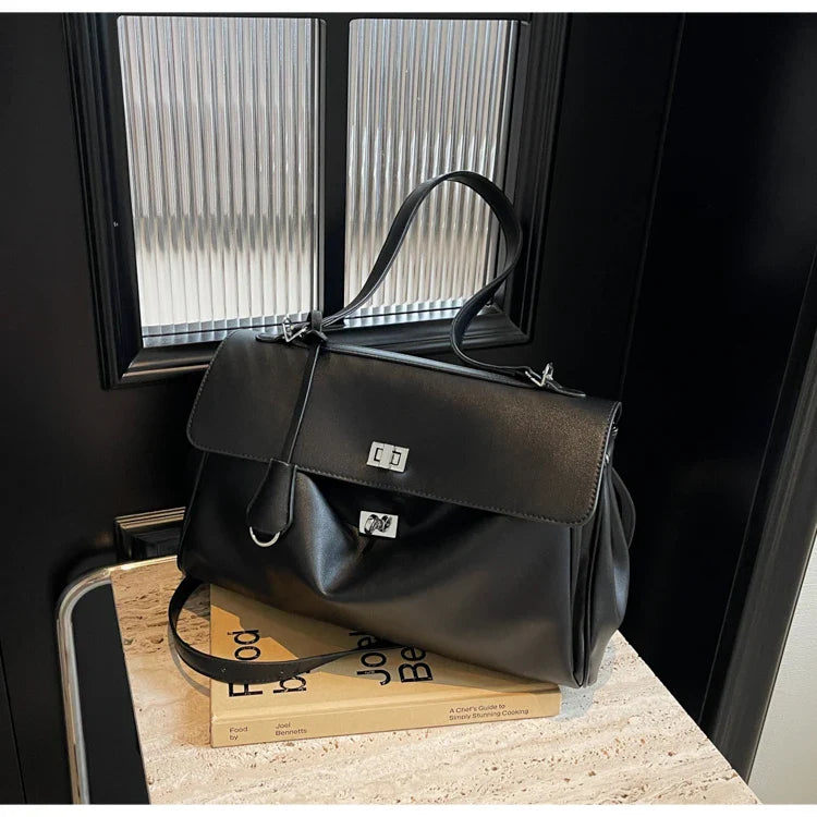 תיק עור סגירת אבזם