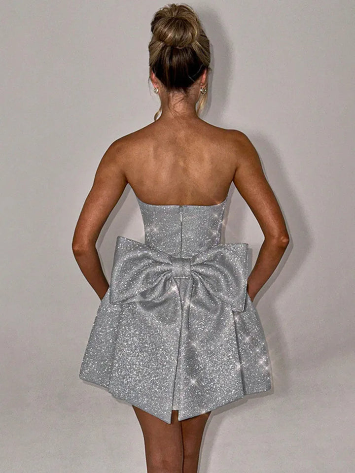 Strapless mini dress with glitter and bow decoration on the back - DIVA