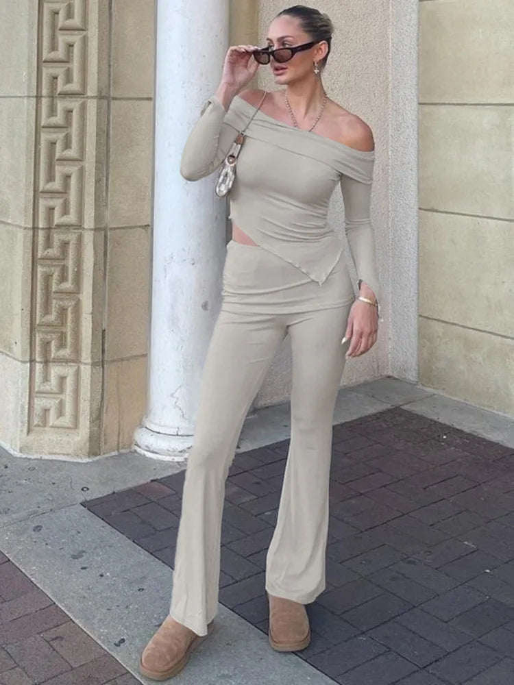 Two-piece knitted set with asymmetrical off-shoulder top and long pants - ROZIE