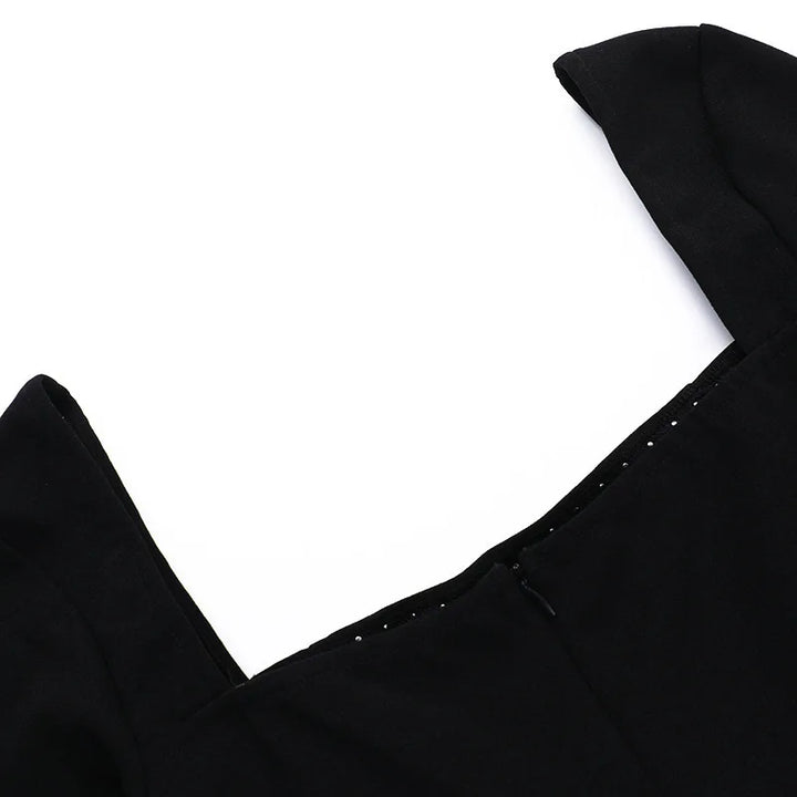 A-line mini dress decorated with pearls - Cory