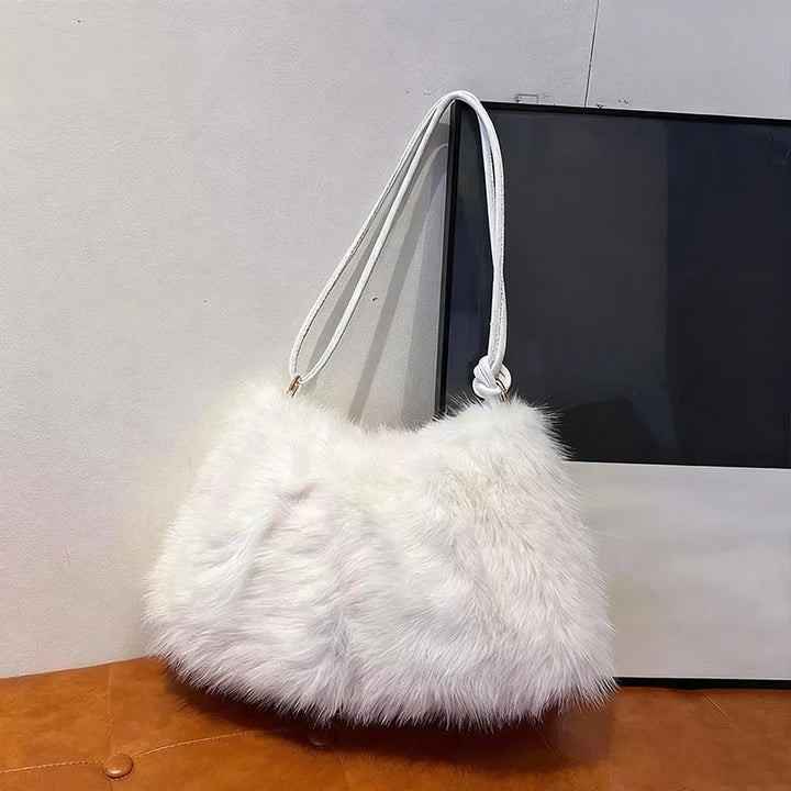 תיק בעיצוב פרוותי