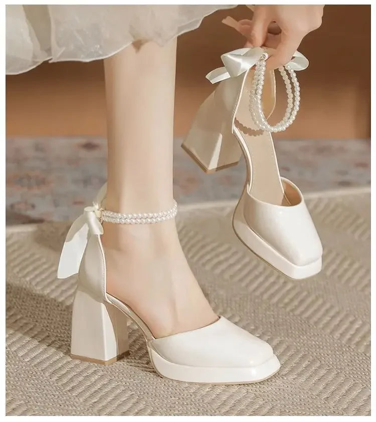 Shiny Faux Leather High Heels with Pearl and Bow Decoration - Vivian