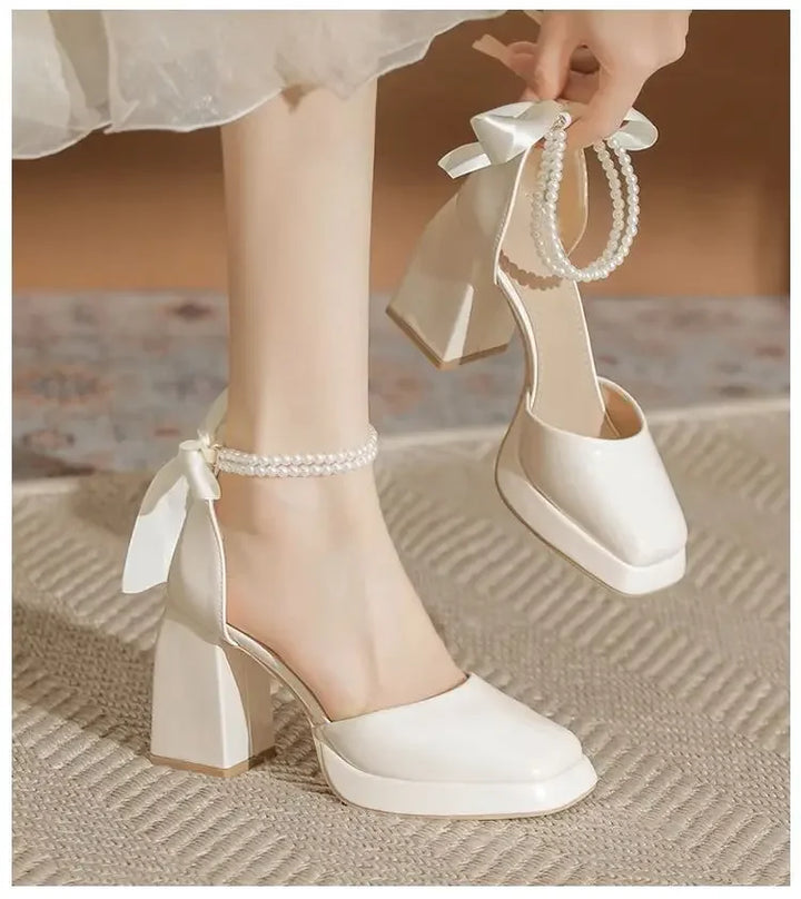 Shiny Faux Leather High Heels with Pearl and Bow Decoration - Vivian