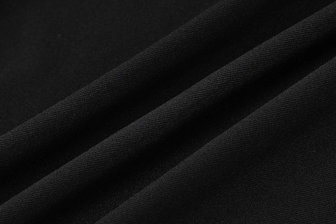 Shaping and Flattering Fabric Jumpsuit with Pedal Pushers and Plunging Neckline - Sirin