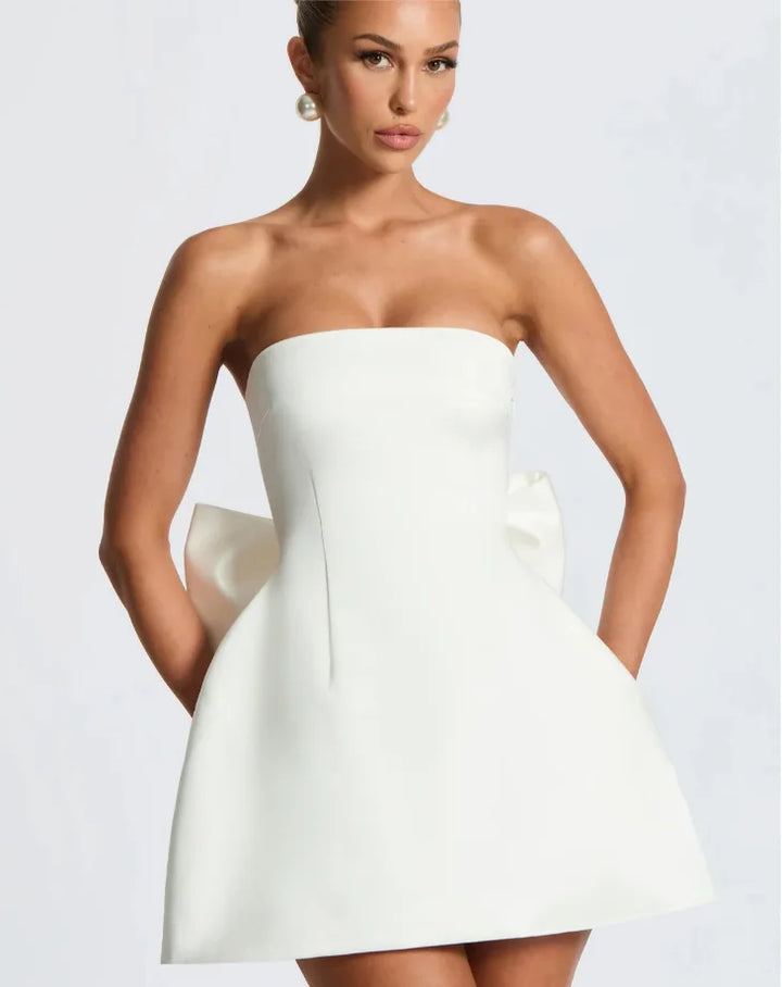 Satin mini dress in A-line cut with tie bow back detail for waist fit - Lilia