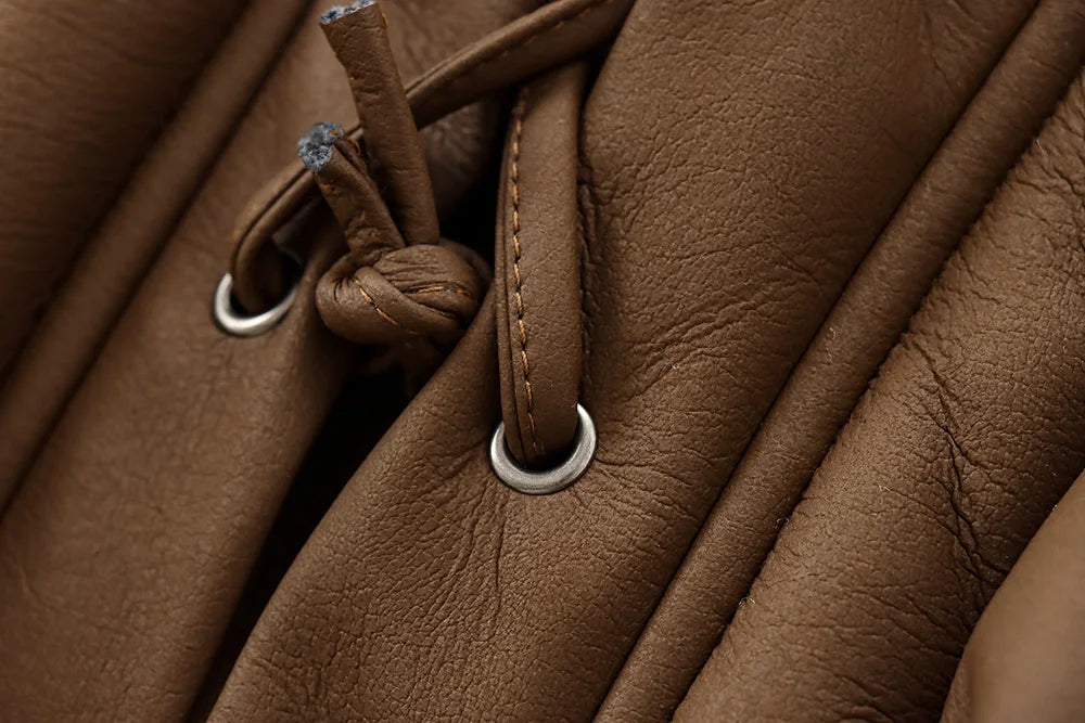 Leather coat with inner fur and belt tie design - Moran