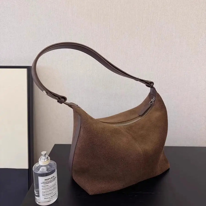 Suede bag with classic design