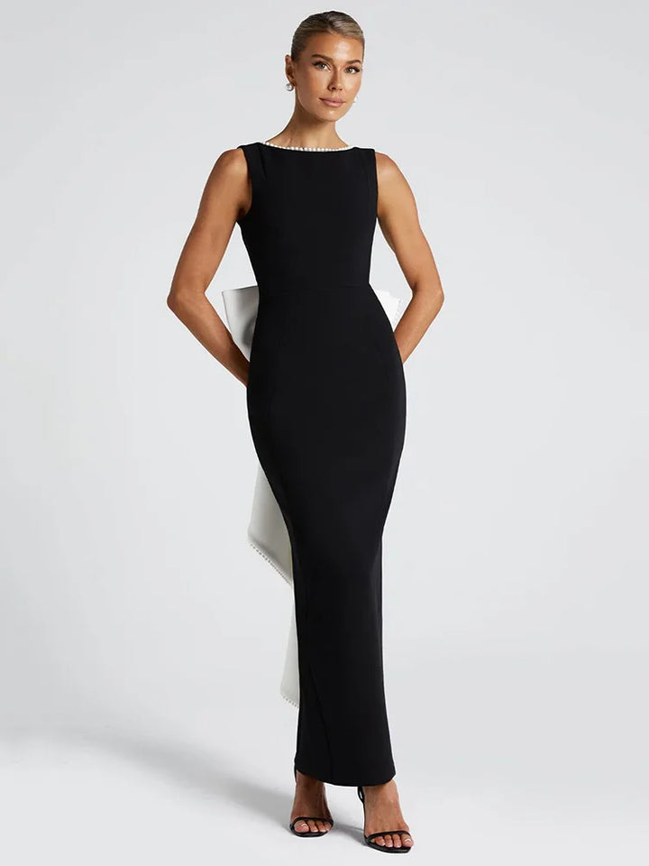 Elegant maxi dress with open back, bow, and pearl decoration - Alberta