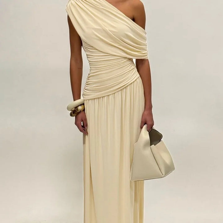 Elegant maxi pleated dress with one shoulder exposed - Maylin