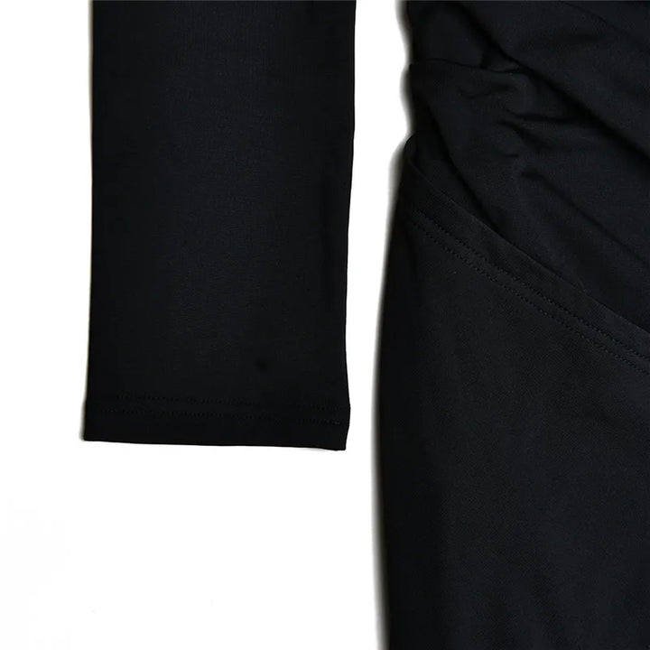 Ruffled maxi dress with shoulder slit and off-shoulder design - Melania