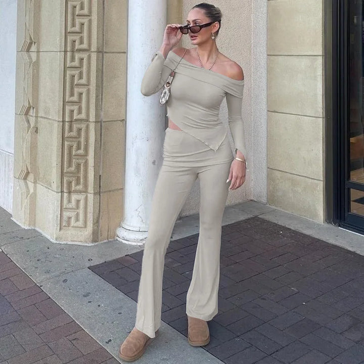 Two-piece knitted set with asymmetrical off-shoulder top and long pants - ROZIE