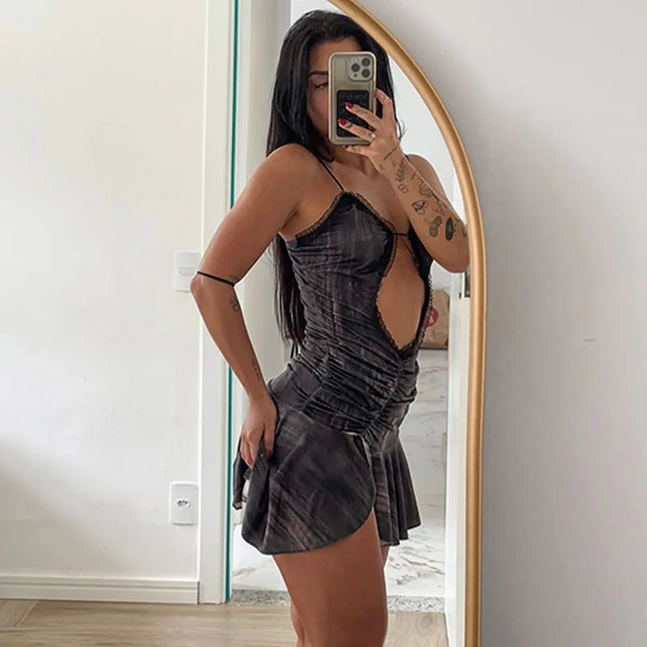 Ruffled mini dress with open back design - Tate