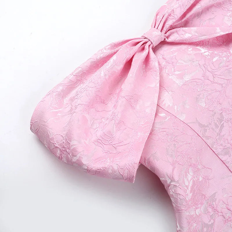 A-line mini dress with bow design and floral embroidery detail - Lenora