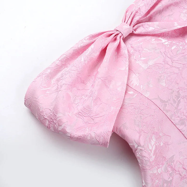 A-line mini dress with bow design and floral embroidery detail - Lenora