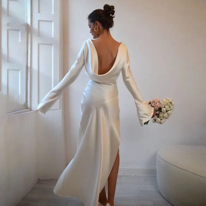 Maxi satin evening dress with open back, slit, and bell sleeves - Marian