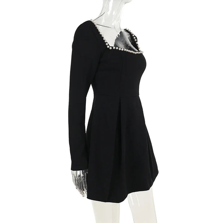 A-line mini dress decorated with pearls - Cory