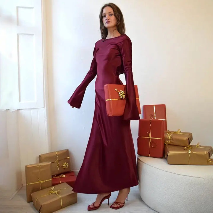 Maxi satin evening dress with open back, slit, and bell sleeves - Marian