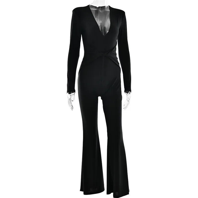 Fitted long jumpsuit with shaping fabric, deep V neckline, and cross decoration - Laini