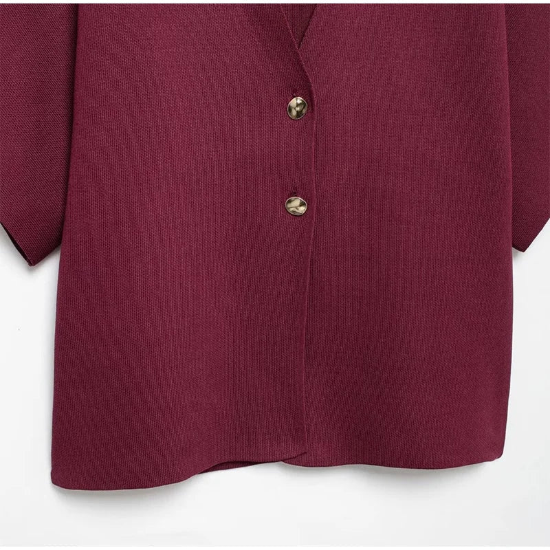 Elegant sweater with gold button decoration - Nela