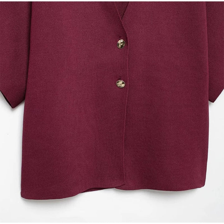Elegant sweater with gold button decoration - Nela