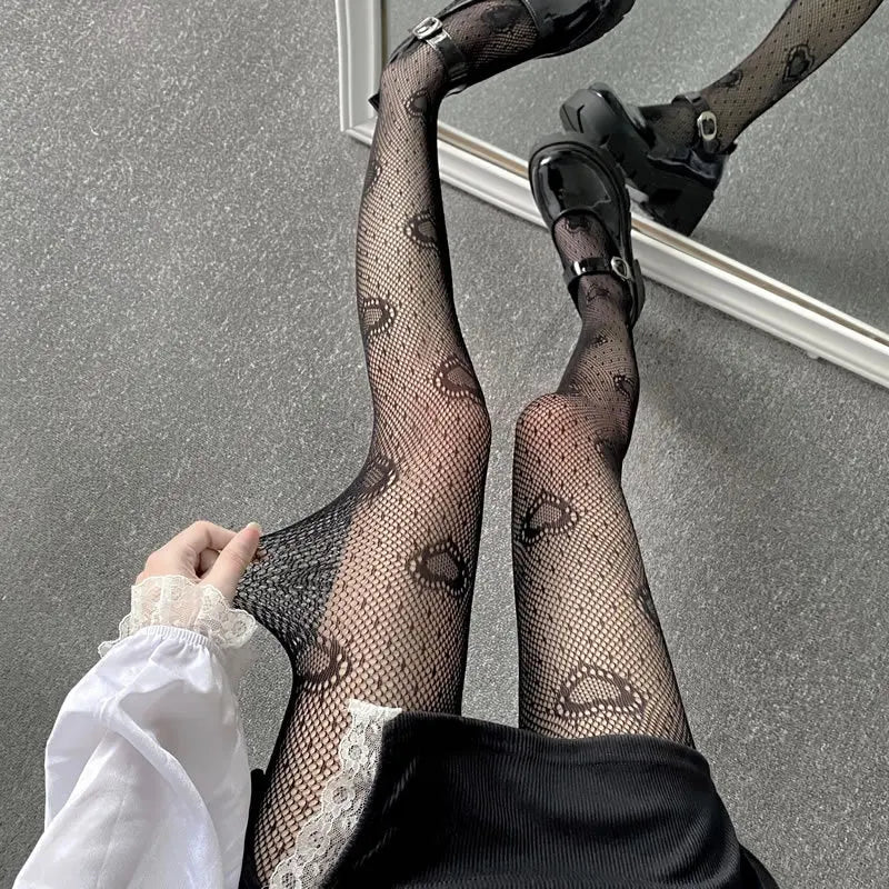 Tights in a variety of textures and shades: lace / hearts / bows / butterflies / mesh / sequins / stars