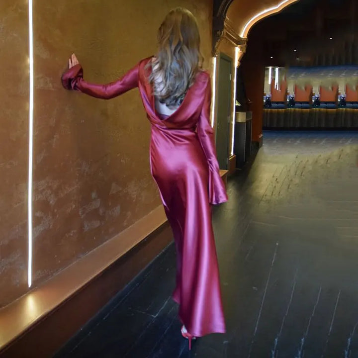 Maxi satin evening dress with open back, slit, and bell sleeves - Marian