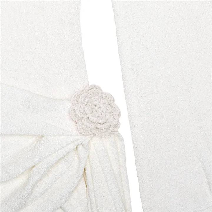 Knitted mini dress with flower and train design and open back - Malia