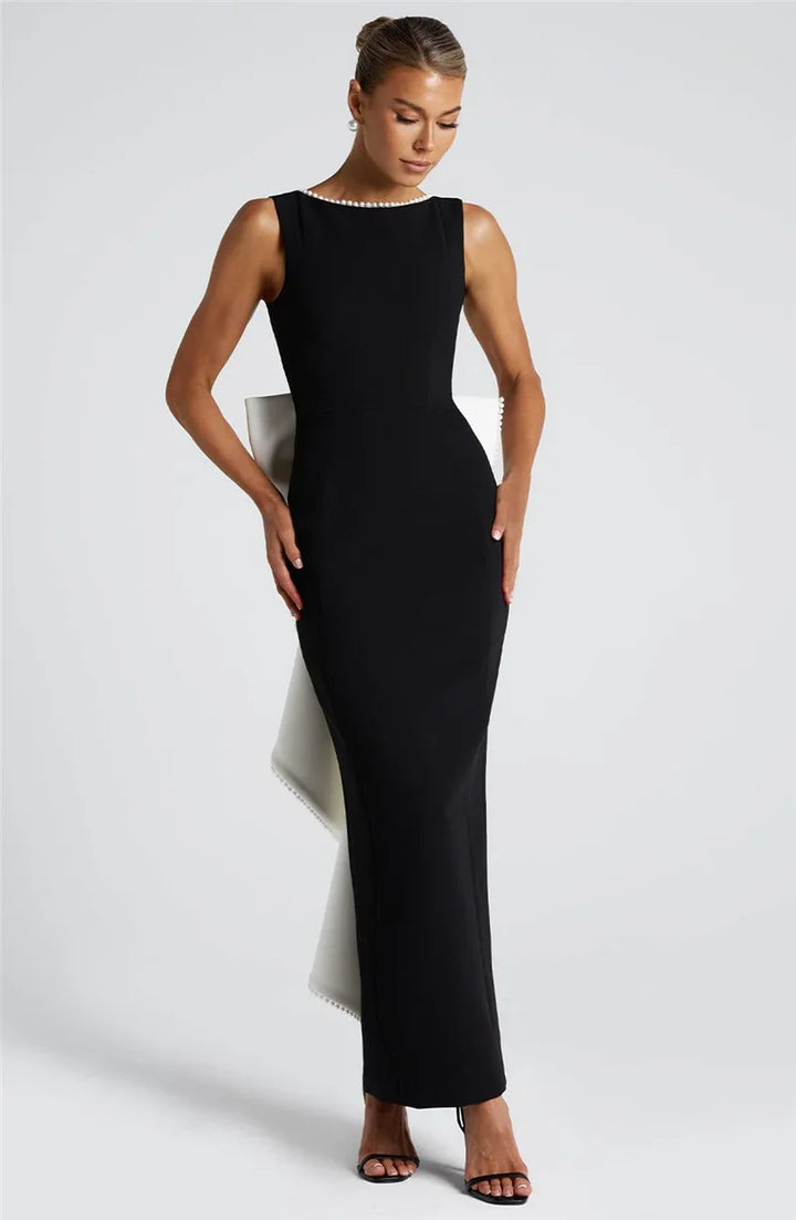Elegant maxi dress with open back, bow, and pearl decoration - Alberta