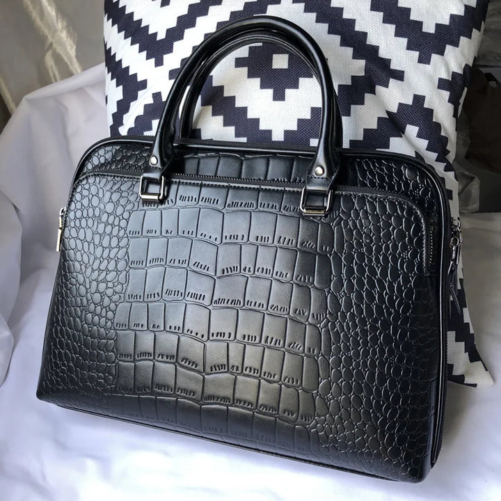 Leather bag with crocodile design