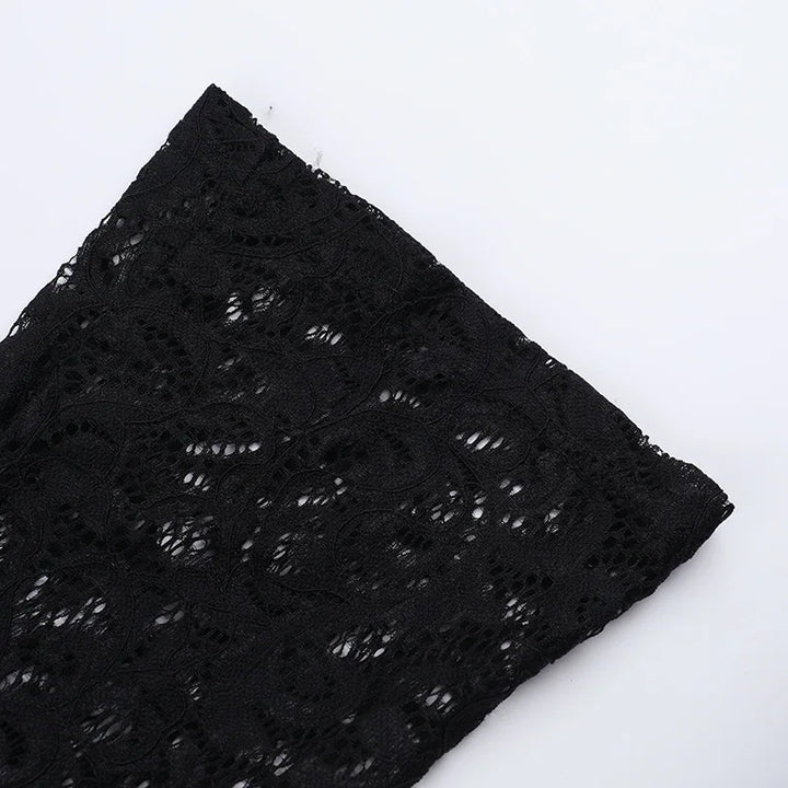 Short lace jumpsuit with long sleeves, hoop design, and open back - Hunter