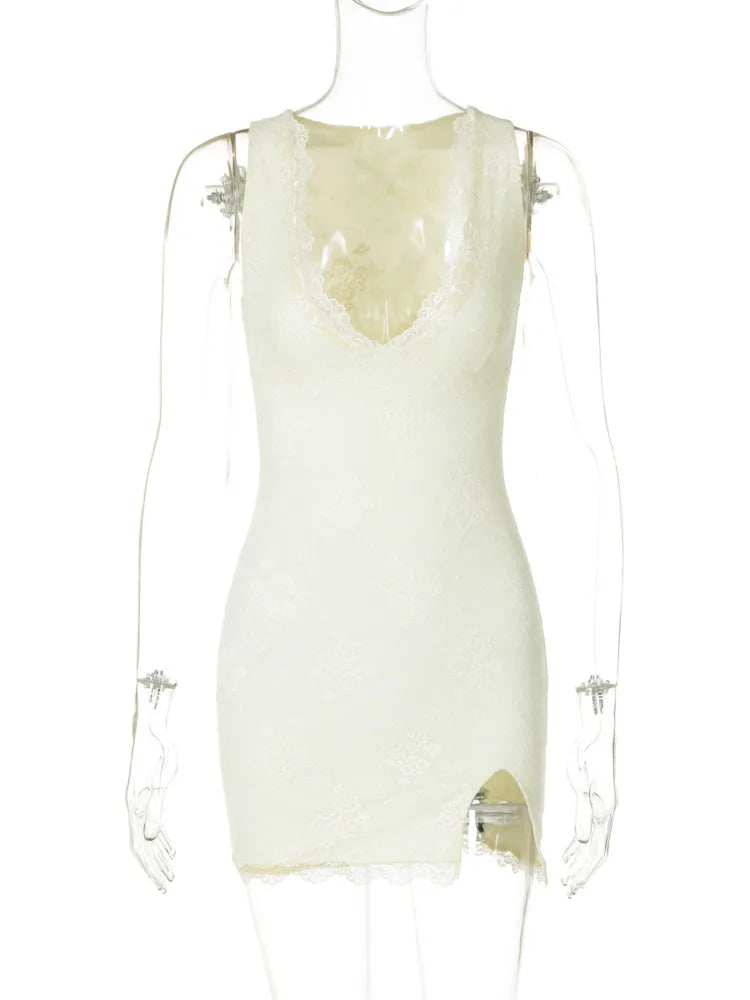 Fitted mini dress with lace, floral embroidery, and small slit - Neil