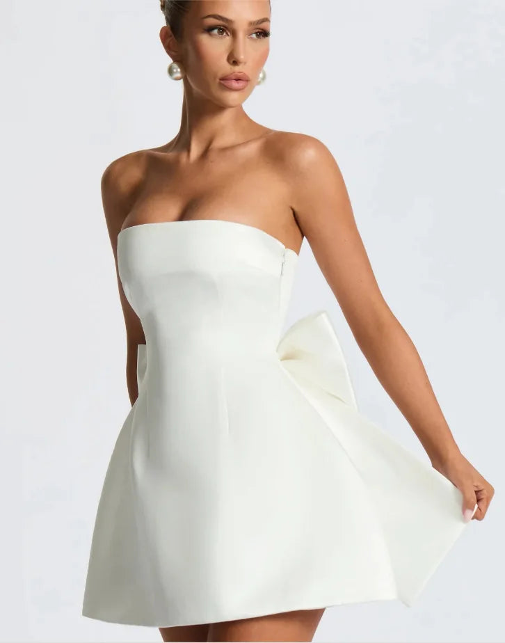 Satin mini dress in A-line cut with tie bow back detail for waist fit - Lilia