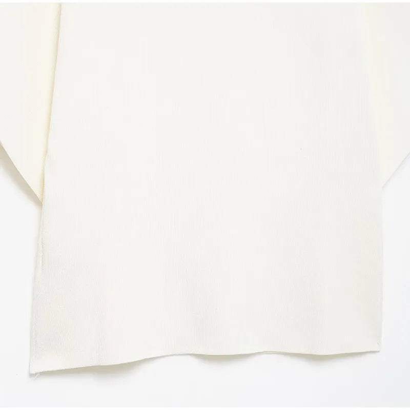 Elegant sweater with gold button decoration - Nela