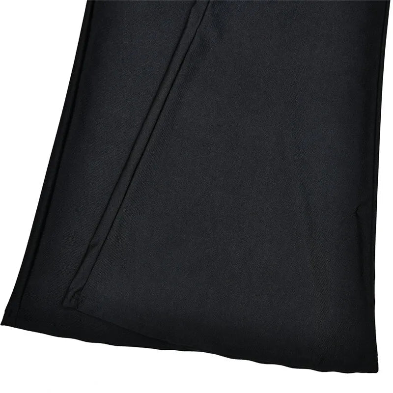 Fitted long jumpsuit with shaping fabric, deep V neckline, and cross decoration - Laini