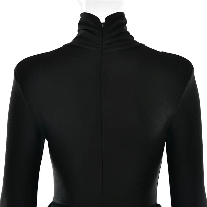 Mini turtleneck dress with chiffon ruched bottom, cross cut, and chiffon ruffle decoration - Marina