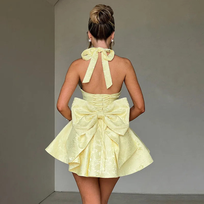 A-line mini dress with floral embroidery, bow detail on the back, tie-back design for waist fit and neck tie - Pearl