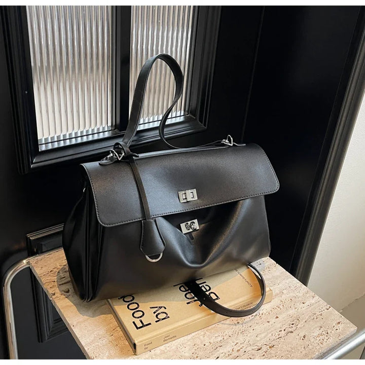 תיק עור סגירת אבזם