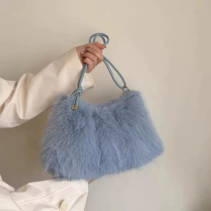 תיק בעיצוב פרוותי