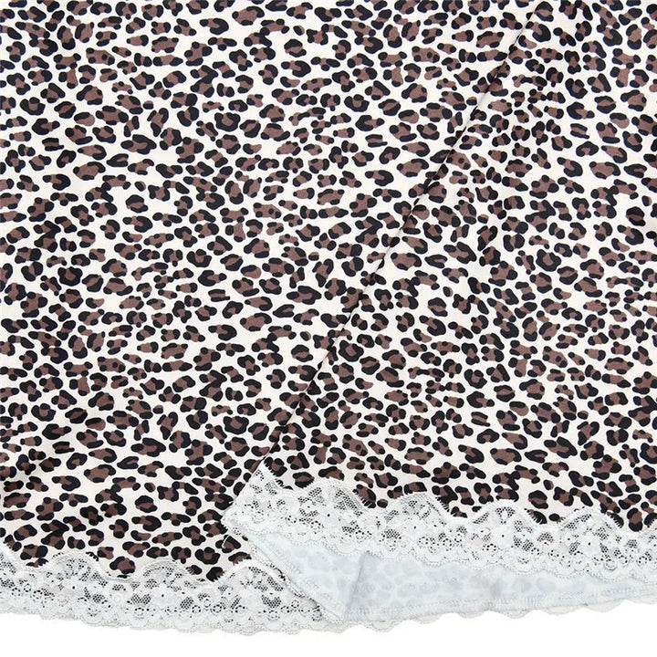 שמלת מיני מנומרת בעיצוב קשירה בצוואר וגב פתוח בעיטור תחרה - נלה