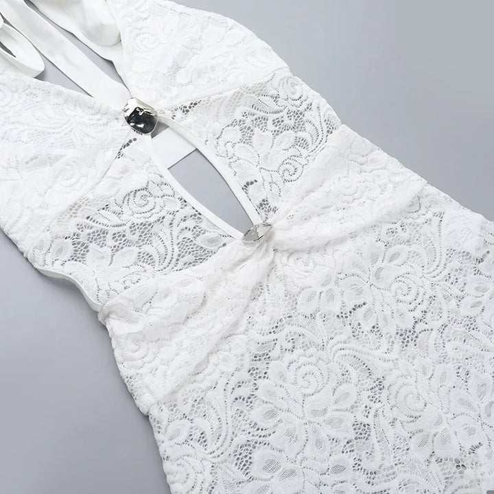 Long lace jumpsuit with open back and buckle details - Brighton