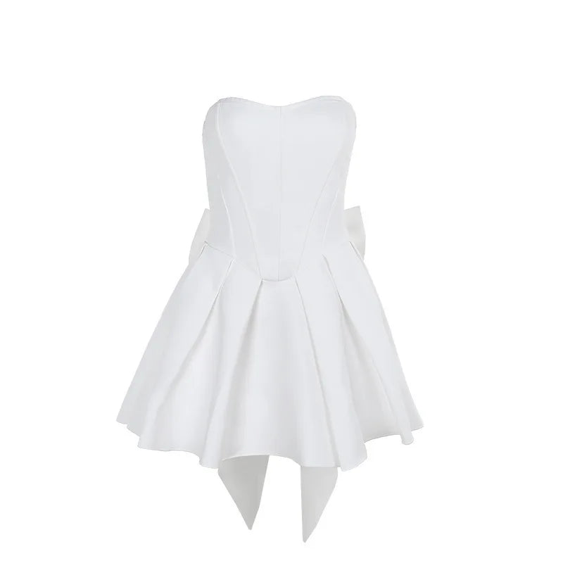 Strapless mini dress with bow detail on the back and added tulle underskirt - Novalee