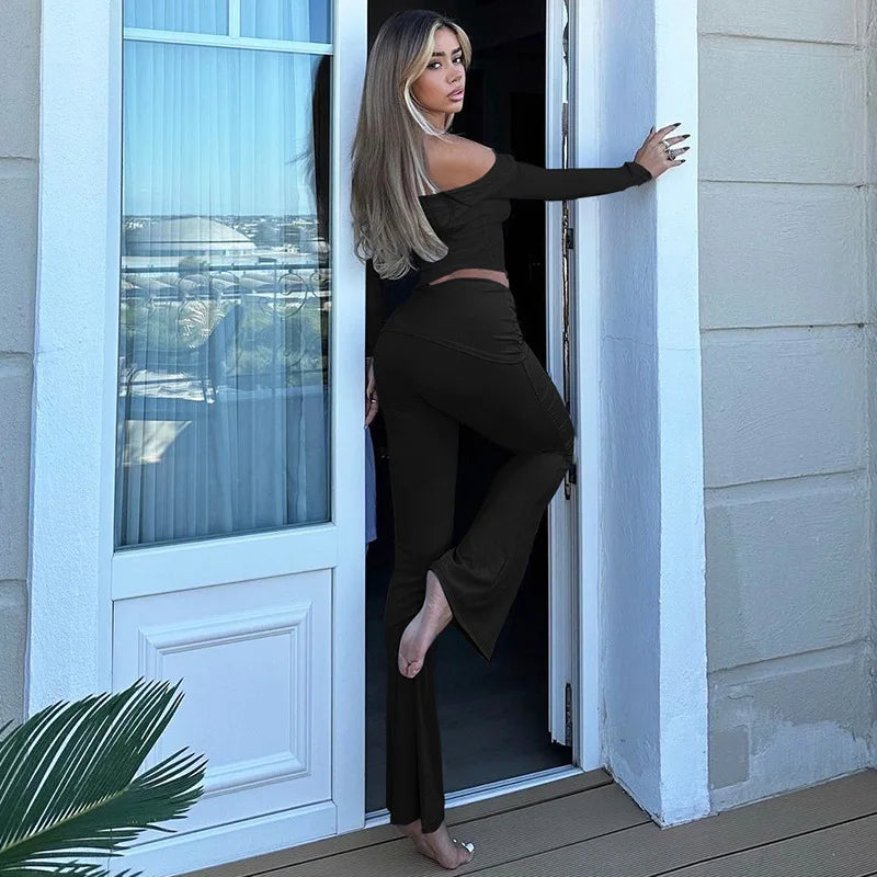Two-piece knitted set with asymmetrical off-shoulder top and long pants - ROZIE